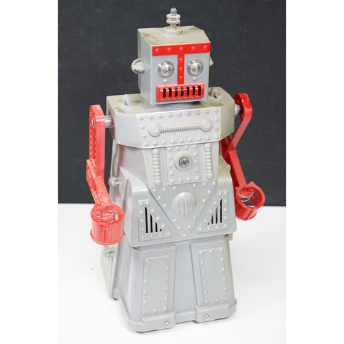 279 - Two boxed tin plate and plastic robots to include Ha Ha Toy Battery Operated Remote Control Piston A... 