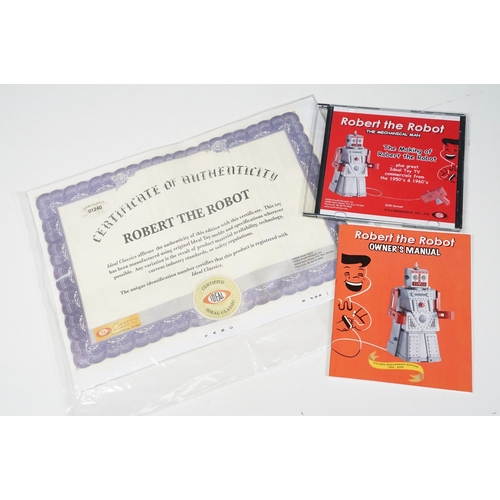 279 - Two boxed tin plate and plastic robots to include Ha Ha Toy Battery Operated Remote Control Piston A... 