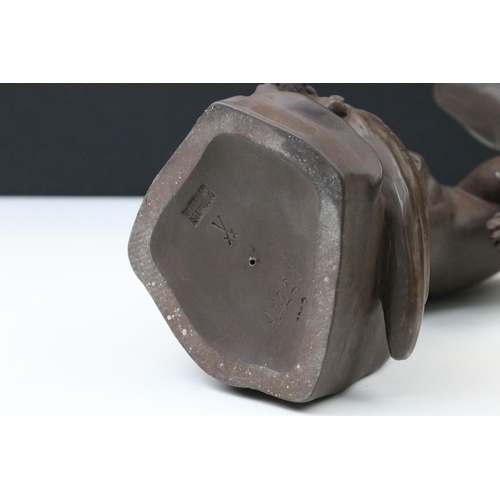 6 - Meissen Bottger Steinzeug red stoneware otter modelled perched on a rock. Impressed marks to base wi... 