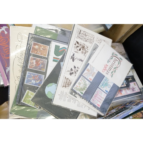 409 - Collection of stamps to include 25 presentation packs mint stamps and a large quantity of kilo ware ... 