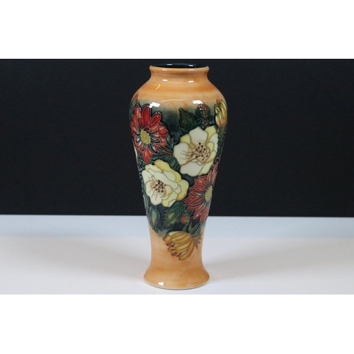 22 - Boxed Moorcroft pottery Victoriana baluster vase, by Emma Blossoms, signed to base