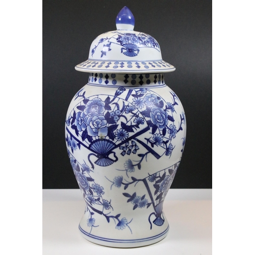24 - Two Chinese porcelain lidded vases to include 19th Century Prunus pattern example, with 2 x blue rin... 