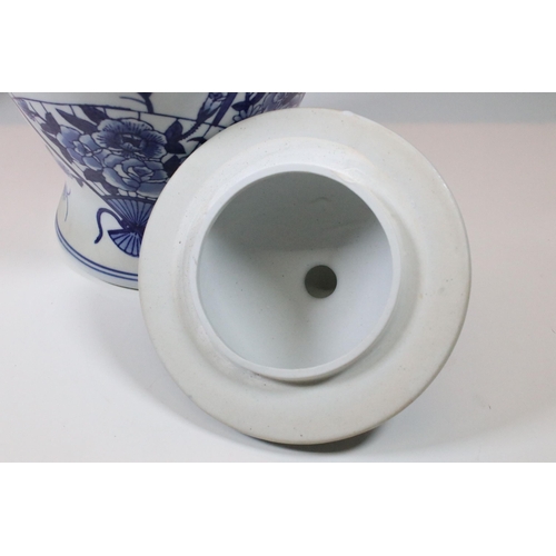 24 - Two Chinese porcelain lidded vases to include 19th Century Prunus pattern example, with 2 x blue rin... 