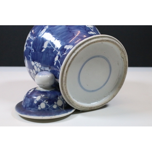 24 - Two Chinese porcelain lidded vases to include 19th Century Prunus pattern example, with 2 x blue rin... 