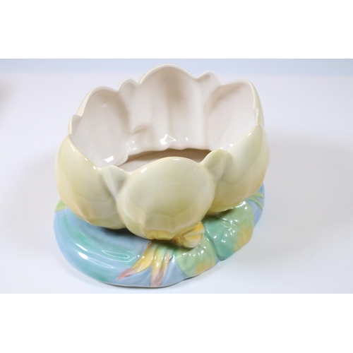 31 - Pair of Clarice Cliff for Royal Staffordshire Ceramics Water Lily vases including one in a pink colo... 