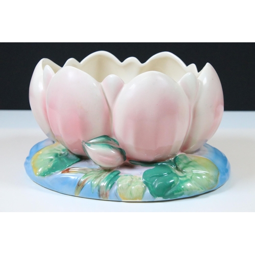 31 - Pair of Clarice Cliff for Royal Staffordshire Ceramics Water Lily vases including one in a pink colo... 