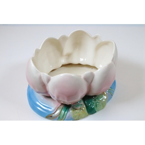 31 - Pair of Clarice Cliff for Royal Staffordshire Ceramics Water Lily vases including one in a pink colo... 