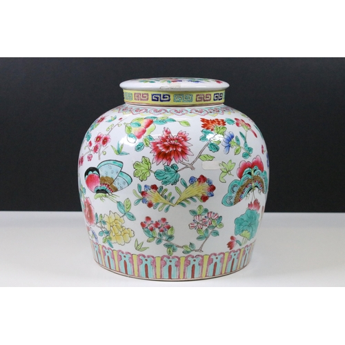 33 - 20th Century Chinese Famille Rose lidded ginger jar with floral and dragon fly decoration