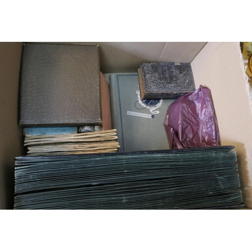 412 - Collection of cigarette cards within albums to include Ogdens examples, Early 20th Century postcards... 