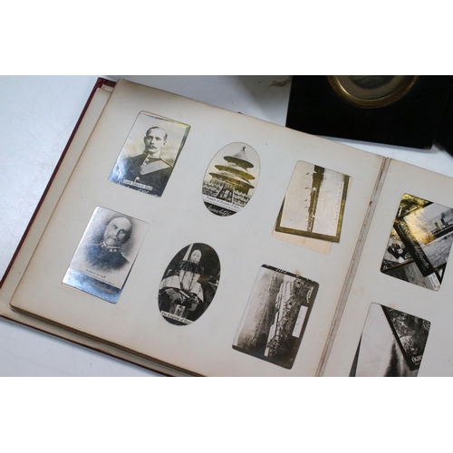 412 - Collection of cigarette cards within albums to include Ogdens examples, Early 20th Century postcards... 