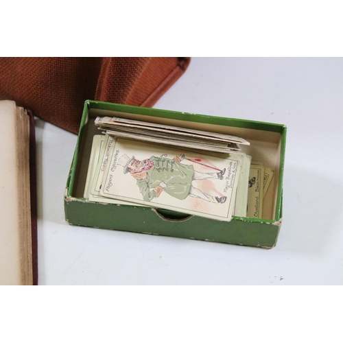 412 - Collection of cigarette cards within albums to include Ogdens examples, Early 20th Century postcards... 