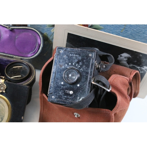 412 - Collection of cigarette cards within albums to include Ogdens examples, Early 20th Century postcards... 