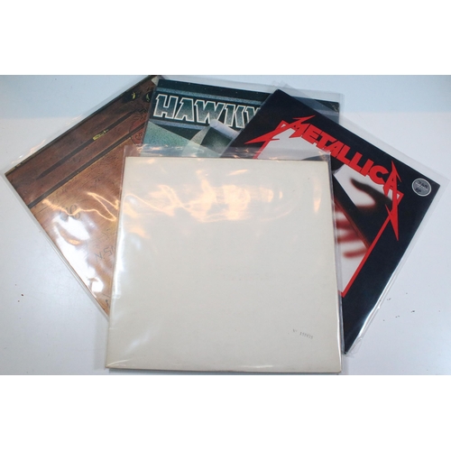 416 - Vinyl - A collection of vinyl LP's spanning the decades and the genres to include The Beatles, Metal... 