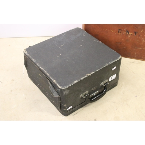 431 - Leather travelling suitcase with initials E.N.T. to top, together with a Royal portable model c type... 