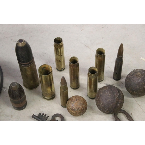 437 - Collection of WWI shell cases and shell cartridges together with a MKIII 1941 TG.Co.Ltd London Compa... 
