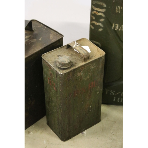 439 - Group of four oil cans including one military example, a Shellmex 1943 can, Valentine and another. L... 