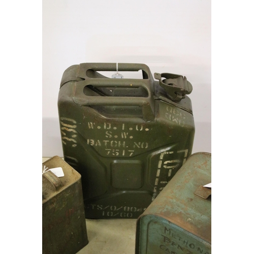 439 - Group of four oil cans including one military example, a Shellmex 1943 can, Valentine and another. L... 