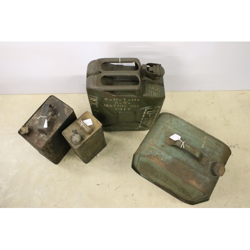 439 - Group of four oil cans including one military example, a Shellmex 1943 can, Valentine and another. L... 