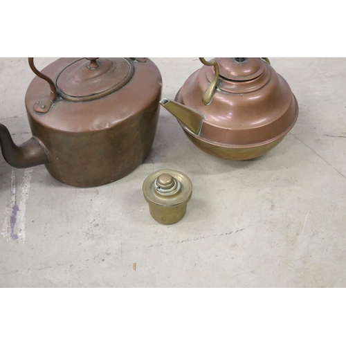 451 - Collection of three copper teapots, one with enamel handle, one with brass handle and spout and one ... 