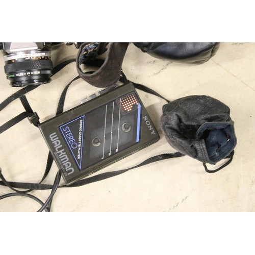 453 - Collection of cameras and equipment to include boxed Olympus XA2, Olympus OM10, tripod stand etc. To... 