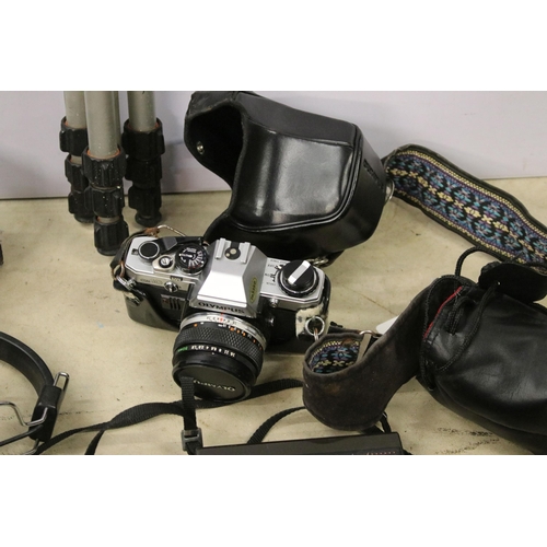 453 - Collection of cameras and equipment to include boxed Olympus XA2, Olympus OM10, tripod stand etc. To... 