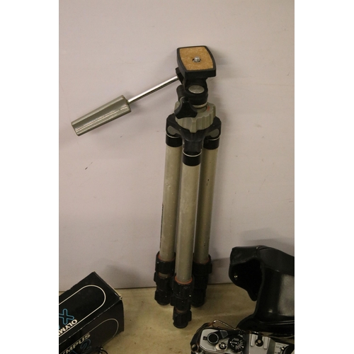 453 - Collection of cameras and equipment to include boxed Olympus XA2, Olympus OM10, tripod stand etc. To... 