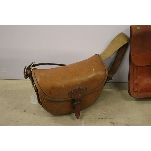 454 - Three leather bags to include two brief cases and a satchel.