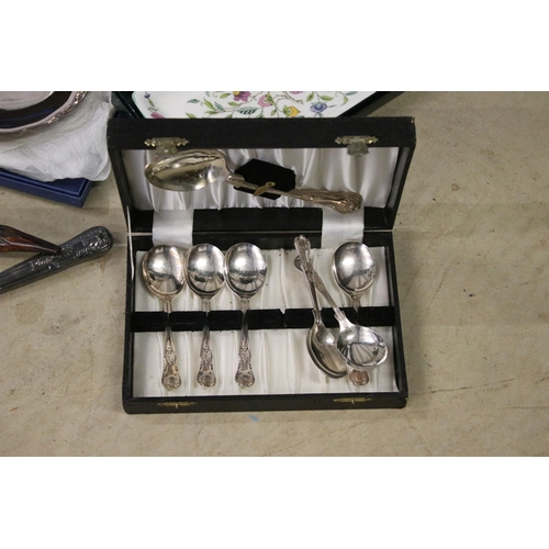 472 - Collection of silver plated cutlery to include a shell pattern cutlery canteen, antler handled carvi... 