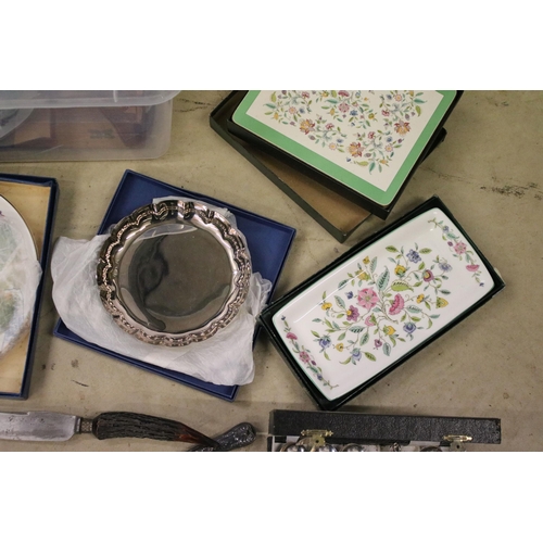 472 - Collection of silver plated cutlery to include a shell pattern cutlery canteen, antler handled carvi... 