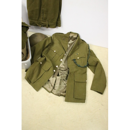 476 - Collection of militaria to include a no. 2 dress uniform, helmet, baby's gas mask.
