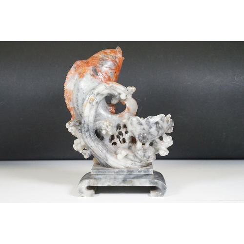134 - Chinese carved soapstone sculpture of a leaping carp, measures 29cm tall