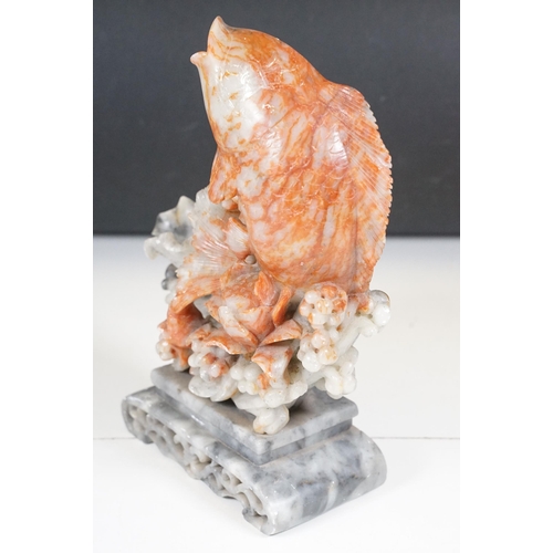 134 - Chinese carved soapstone sculpture of a leaping carp, measures 29cm tall