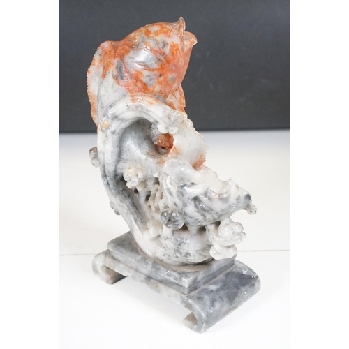 134 - Chinese carved soapstone sculpture of a leaping carp, measures 29cm tall