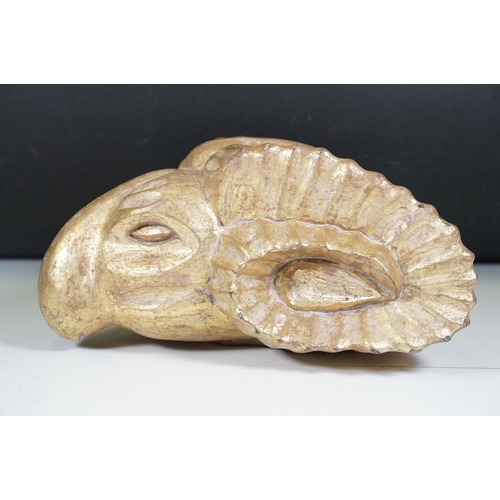 136 - Gilt wooden carved model of a rams head, measures 35cm long