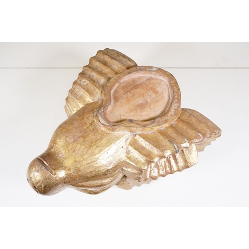 136 - Gilt wooden carved model of a rams head, measures 35cm long