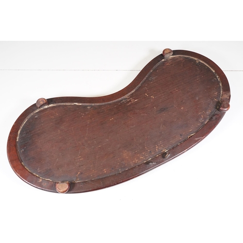 138 - Late 19th Century Victorian mahogany framed beadwork with four wooden bun feet and glazed top in the... 