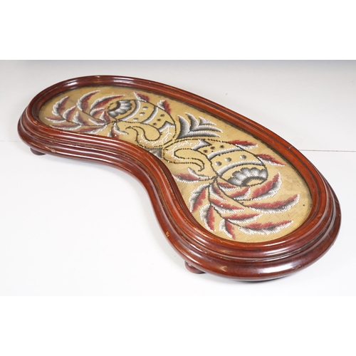 138 - Late 19th Century Victorian mahogany framed beadwork with four wooden bun feet and glazed top in the... 