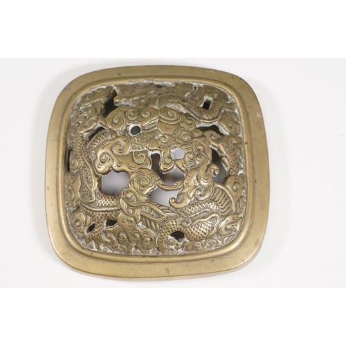 141 - Chinese bronzed lidded censer with dragon and traditional detailing, with twin handles on four legs,... 
