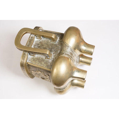 141 - Chinese bronzed lidded censer with dragon and traditional detailing, with twin handles on four legs,... 