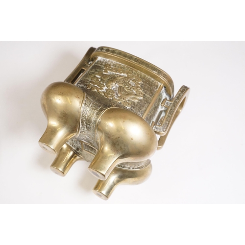 141 - Chinese bronzed lidded censer with dragon and traditional detailing, with twin handles on four legs,... 