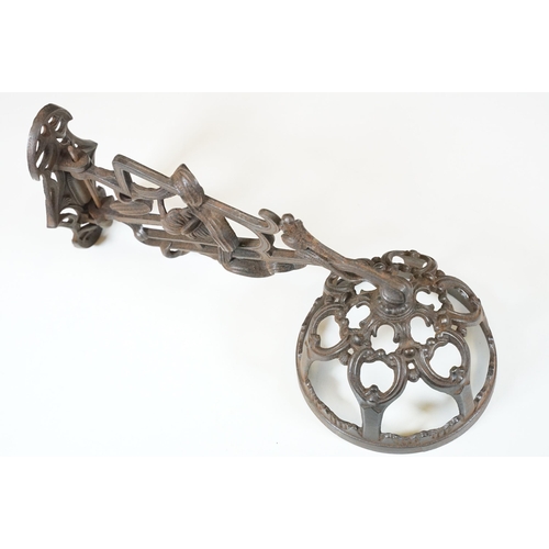 159 - Art nouveau late 19th century pierced iron wall bracket of foliate sinuous design, stamped with a re... 