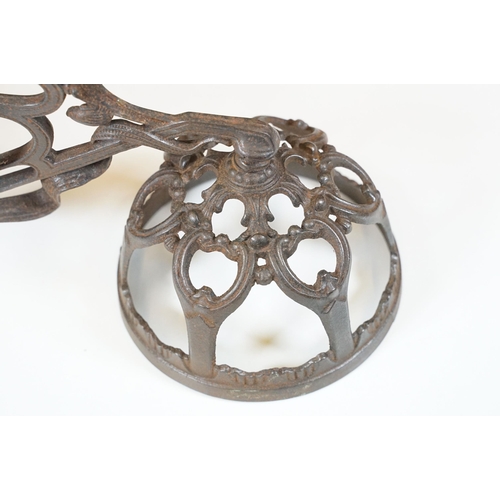 159 - Art nouveau late 19th century pierced iron wall bracket of foliate sinuous design, stamped with a re... 