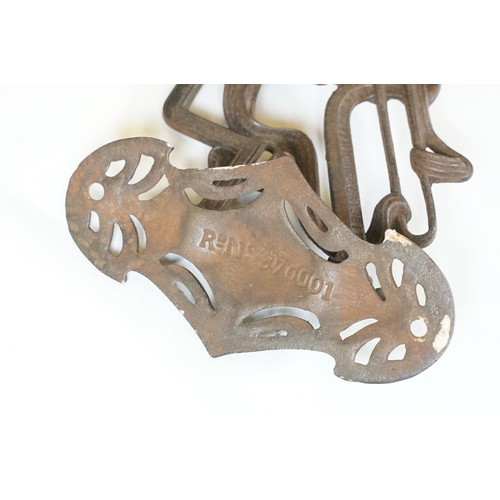 159 - Art nouveau late 19th century pierced iron wall bracket of foliate sinuous design, stamped with a re... 