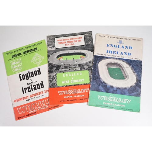 407 - Collection of 1960s football programmes and later football books to include International examples