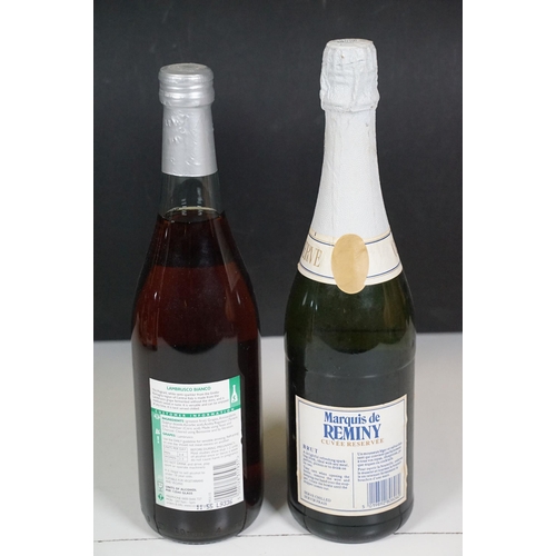 488 - Alcohol - Collection of 11 bottles of mixed alcohol to include The Famous Grouse Scotch Whisky Rugby... 