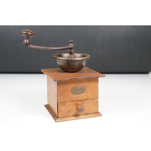 143 - Early 20th century French ‘ Peugeot Freres ‘ coffee grinder with metal mechanism and wooden base wit... 