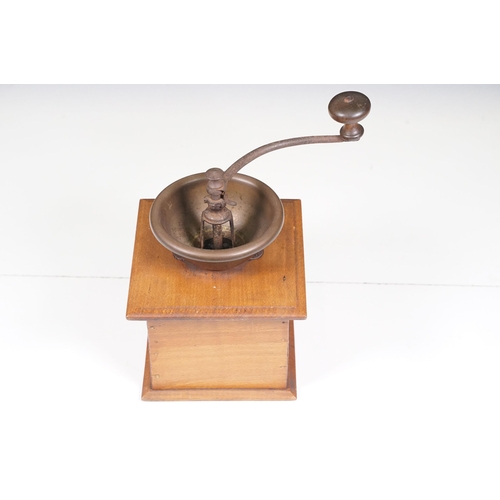 143 - Early 20th century French ‘ Peugeot Freres ‘ coffee grinder with metal mechanism and wooden base wit... 
