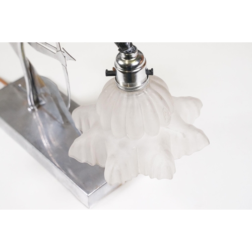 154 - Art Deco chrome lamp depicting a figure firing a bow and arrow with frosted glass shade