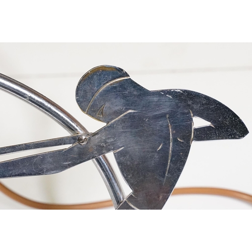 154 - Art Deco chrome lamp depicting a figure firing a bow and arrow with frosted glass shade