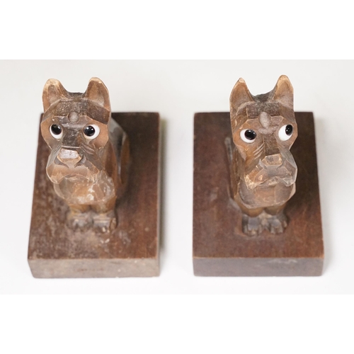 155 - Pair of Art Deco wooden carved ‘Scottie Dog ‘ bookends, with glass eyes, 15cm high